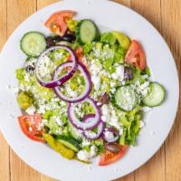 Greek Style Salad · Tomato, cucumber, red onion, Kalamata olives, feta cheese, romaine lettuce, Greek dressing.