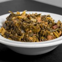 Collard Greens  · Our collards are hand picked & slow cooked with flavorful smoked brisket pieces. This is a u...