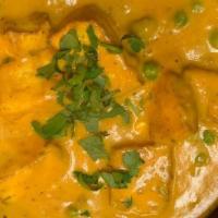 Muttar Paneer · Fresh cottage cheese cubes prepared with green peas in onions based curry sauce.