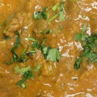 Chicken Curry · Chicken cooked with a delicately spiced curry sauce. The benchmark of Indian cuisine.