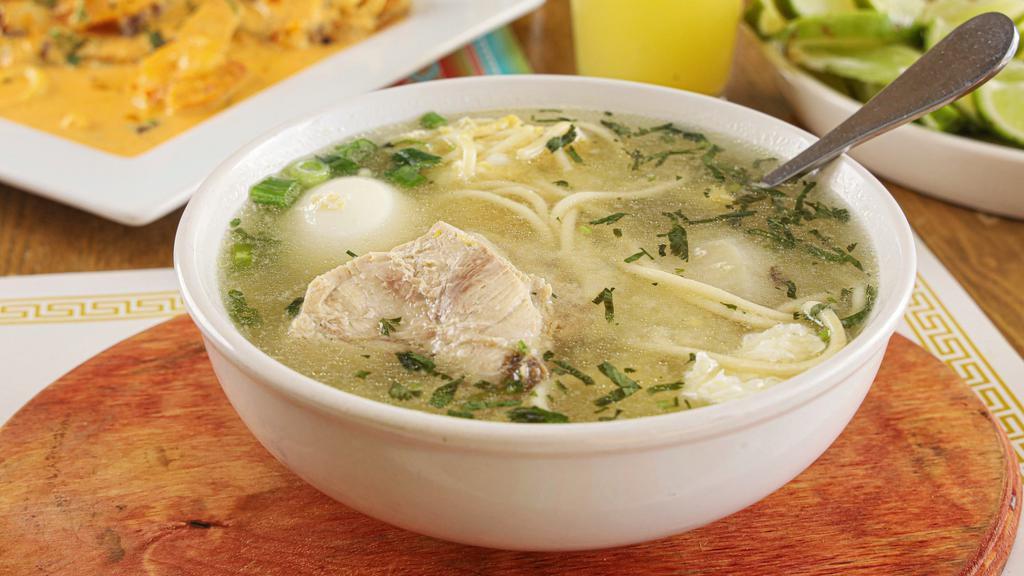 Caldo De Gallina · Exquisite soup made with chicken, noodles, hard-boiled egg and potatoes.