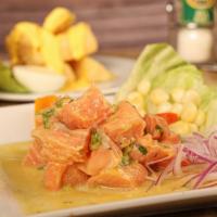 Ceviche De Salmón · Spicy. Salmon with huancaina and a lime and lemon juice.

Consuming raw or undercooked meats...