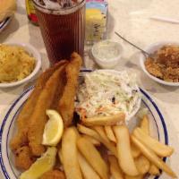 Southern Fried Catfish Plate · Freshly prepared and served with french fries, coleslaw and hush puppies.