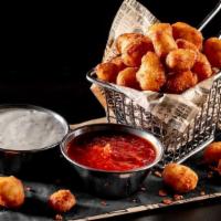 Cheddar Cheese Bites (1840 Cals) · Yellow & white Cheddar cheese, lightly fried & served with zesty marinara sauce & ranch dres...