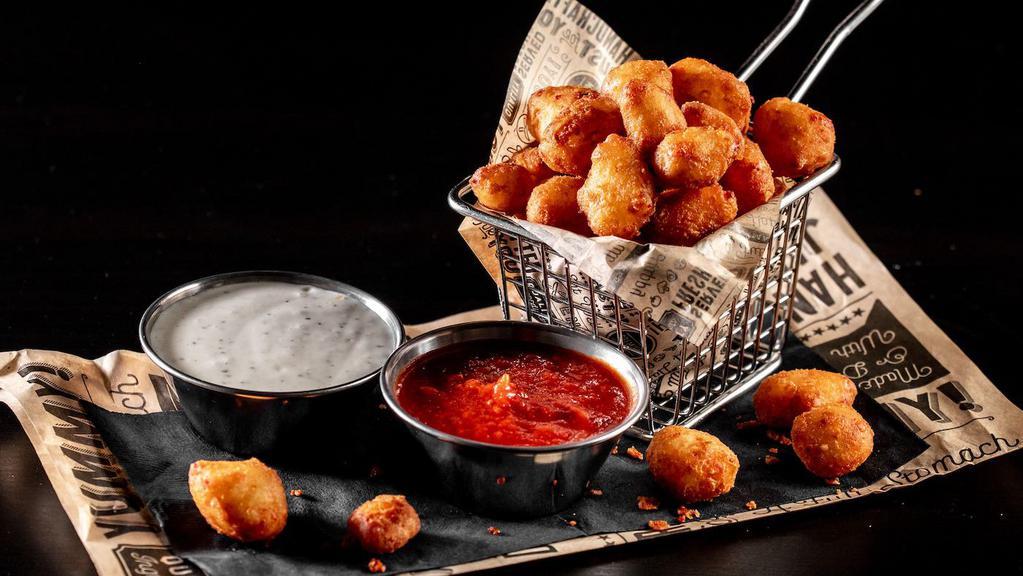 Cheddar Cheese Bites (1840 Cals) · Yellow & white Cheddar cheese, lightly fried & served with zesty marinara sauce & ranch dressing.