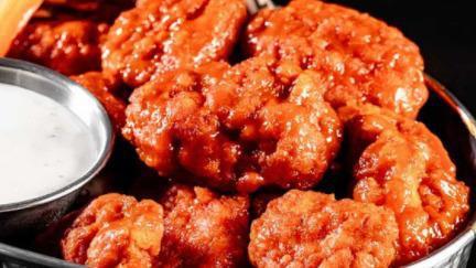 Boneless Wings (1190-1730 Cals) · Boneless wings, tossed with your choice of sauce. Served with ranch or blue cheese dressing.