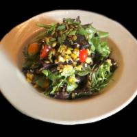 Cilantro Lime Salad · 280 cal. organic baby greens, jack cheese, heirloom tomatoes, grilled corn, pumpkin seeds, c...