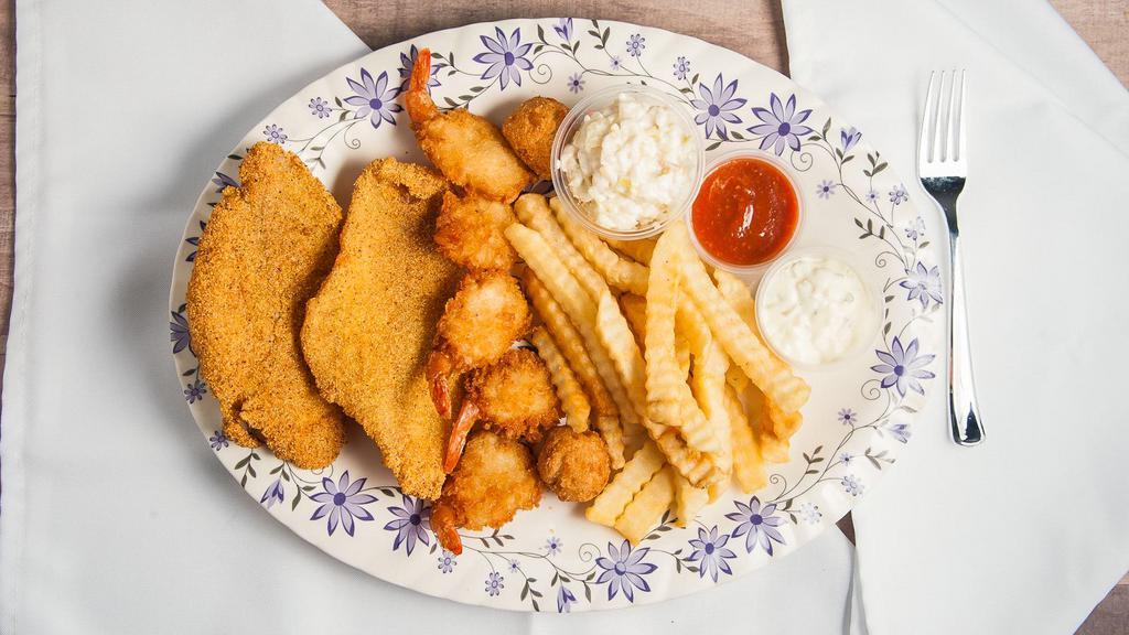 6 Pc Shrimp & 1 Pc Catfish · COMBO With  COCKTAIL SAUCE,fries, coleslaw and hush puppies and drink