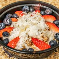 Brazilian Açai Bowl · Organic açai, banana, blueberry, strawberry, coconut flakes, organic granola, and organic ag...