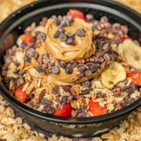 Peanut Butter Açai Bowl · Organic açai, banana, strawberry, blueberry, chocolate chips granola, cacao nibs and peanut ...