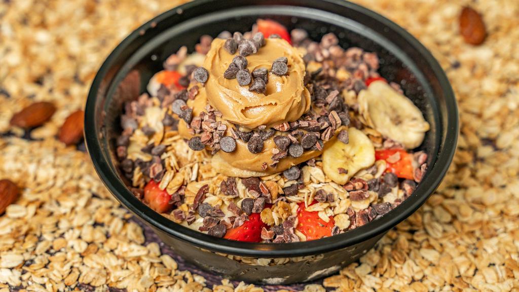 Peanut Butter Açai Bowl · Organic açai, banana, strawberry, blueberry, chocolate chips granola, cacao nibs and peanut butter. Additional fruits or toppings for additional charge.
