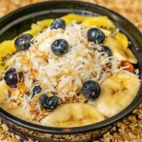 Signature Açai Bowl · Organic açai, banana, blueberry, kiwi, vanilla and almond granola, coconut flakes, organic h...
