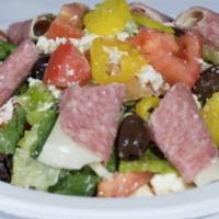 Greek Salad · Feta cheese, kalamata olives, tomatoes, cucumbers, red onions, green peppers, salami and pro...