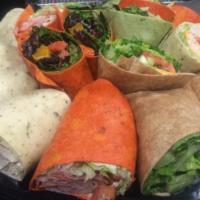 Chef Salad Wrap · Romaine lettuce, tomatoes, ham, turkey, cheddar, provolone, and a hard boiled egg.