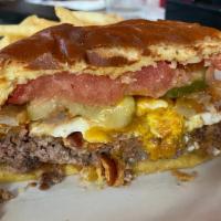 Undertaker · Topped with applewood-smoked bacon, two slices American cheese, fried egg, fried onion straw...