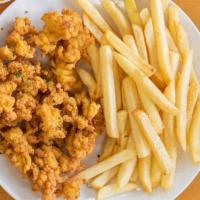 Fried Conch Dinner · Halal. Served with French fries and bread.