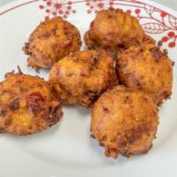 Conch Fritters · Six pieces.