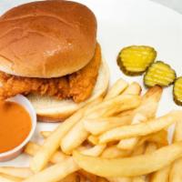 Chicken Sandwich · served with french fries pickles and conch sauce or hot sauce