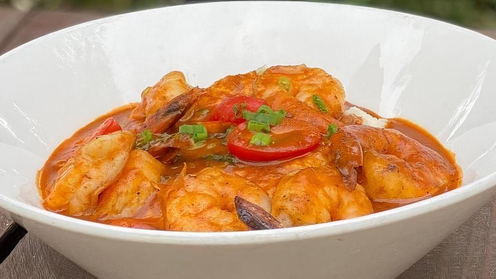 Shrimp & Grits · Jumbo shrimp in creole sauce served with island grits.