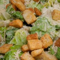 Caesar Salad · Romaine lettuce with savory croutons, fresh parmesan cheese, and creamy Caesar dressing.