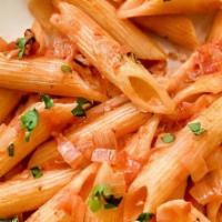 Penne Alla Vodka · Penne pasta coated in a delicious, creamy vodka sauce, and topped with fresh parmesan cheese.