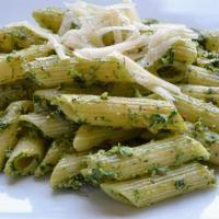 Penne Pesto · Penne pasta tossed in a savory pesto sauce and topped with fresh parmesan cheese.