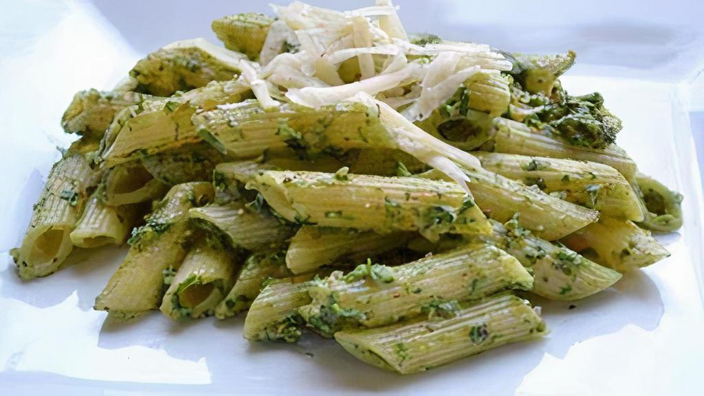 Penne Pesto · Penne pasta tossed in a savory pesto sauce and topped with fresh parmesan cheese.