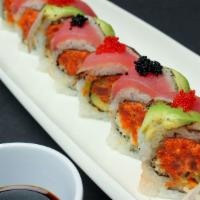 Mad Tuna Roll (8 Pcs) · Spicy tuna & tempura flakes, topped with seared tuna Tataki & avocado.