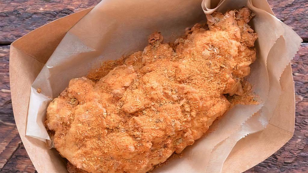 Jumbo Chicken Tender · 1 of our famous jumbo, buttermilk herb marinated, double hand-breaded chicken tenders