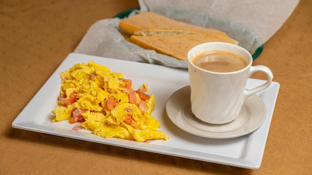 Breakfast Combo · Includes: coffee with milk, toast, omelette. Choice of ham, cheese, vegetable or sausage.