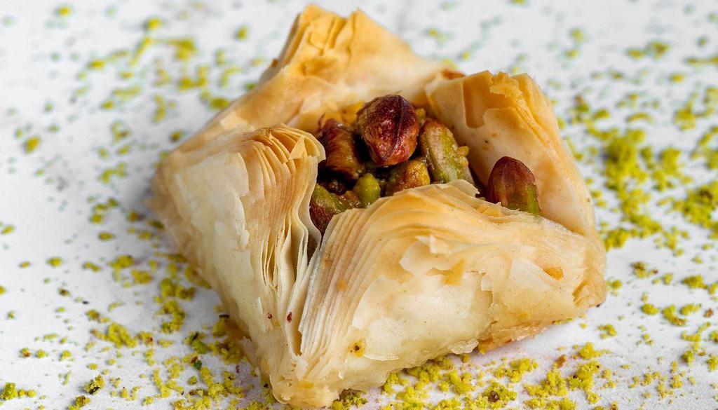 Bird'S Nest · A baklava variety that consists of layered rectangular sheets of phyllo dough that are filled with chopped pistachios or cashews.