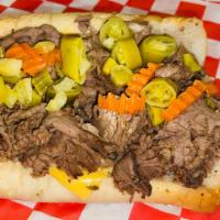 Italian Beef · Slow roasted beef cooked in our flavorful Au Jus gravy on a fresh baked French roll (served ...