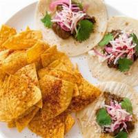 Steak Three Tacos · Taco-bout it. Seriously. USDA Prime Filet Mignon marinated with rocoto, garlic and spices to...