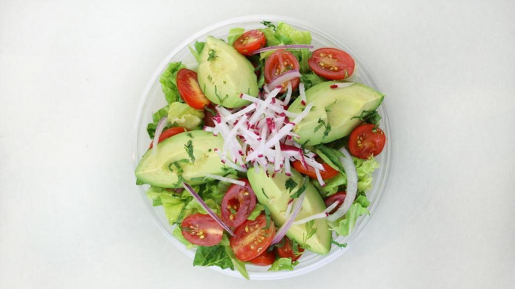 Avocado Tomato Salad · Mixed lettuces with red onions, cherry tomatoes, avocado, radishes & cilantro.