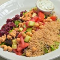 Vegetarian Bowl · Quinoa, chopped salad, curry chickpeas, collard green.