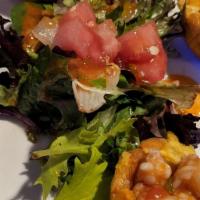 Mofongo · Island style meat or shrimp stuffed plantains, served with crisp green salad.