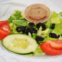 Classic House Salad · Lettuce, tomatoes, black olives, and cucumbers.