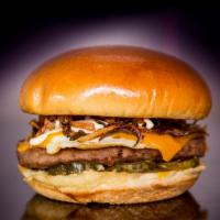 Cheeggse Burger · Ground angus beef, cage-free over medium egg. Caramelized onion and butter pickless, cheddar...