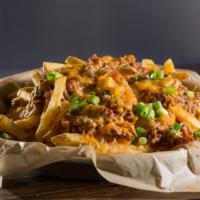 Chili Cheese Fries · Our traditional French fries topped with chili and cheddar jack cheese. Think that's too muc...