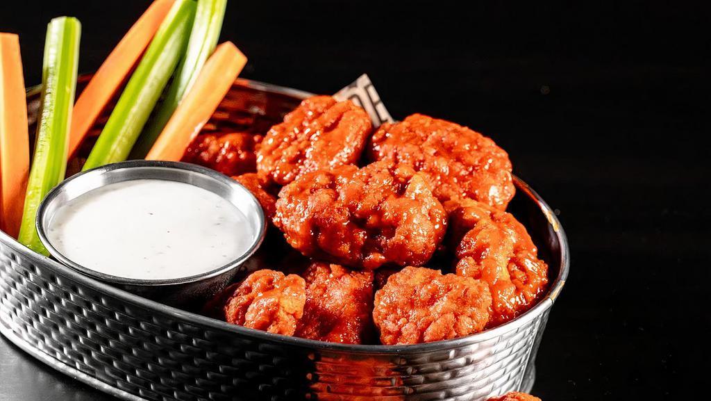 Boneless Wings (1190-1730 Cals) · Boneless or bone-in wings (add $1.00), tossed with your choice of sauce. Served with ranch or blue cheese dressing.