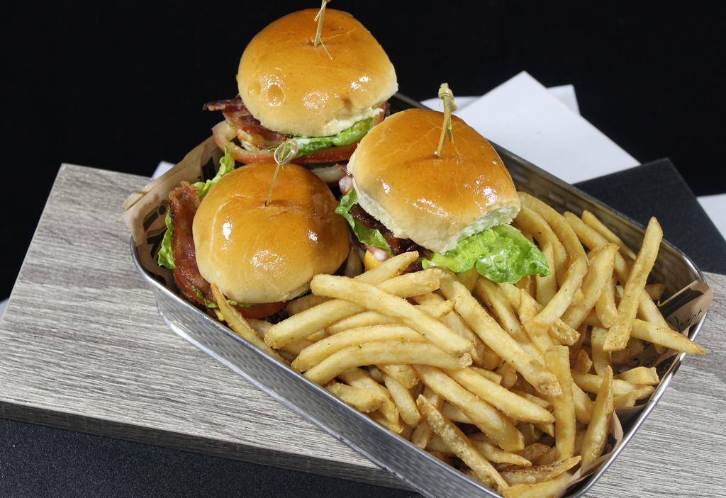 Bacon Cheeseburger Sliders (1510 Cal) · Three mini burgers topped with Applewood smoked bacon, American cheese, leaf lettuce, tomato & our signature burger sauce on brioche buns.
