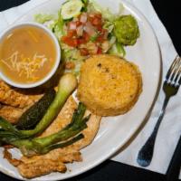 Pollo A La Plancha · Grilled chicken breast. With rice, beans, and salad.
