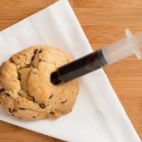 Sweet Shot Cookie · Mouthwatering mega cookie of the week syringe filled with the filling of your choice.