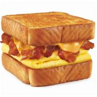 Breakfast Toaster® · Your choice of bacon or sausage w/ egg, cheese & served on Texas Toast