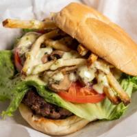 Kendall Burger · Beef patty stuffed with american cheese, seasoned mushrooms, french fries, garlic-n-cilantro...