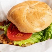 Gables Sandwich · Seasoned chicken breast, bacon, swiss cheese, garlic-n- cilantro aioli, lettuce and tomato.