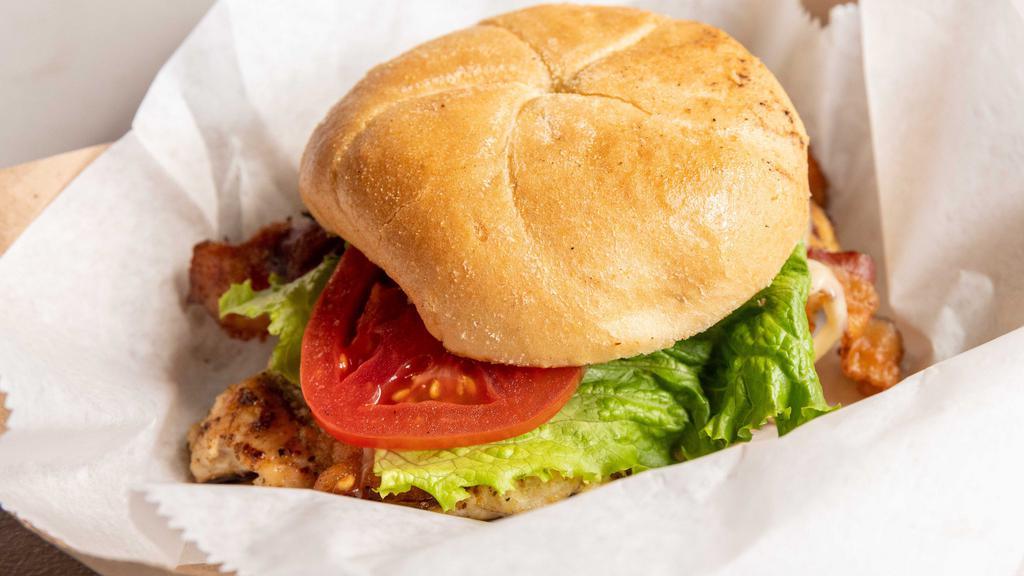 Gables Sandwich · Seasoned chicken breast, bacon, swiss cheese, garlic-n- cilantro aioli, lettuce and tomato.