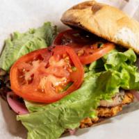 7 Mile Burger · Salmon patty, seasoned mushrooms, pickled onions, lettuce and tomato.