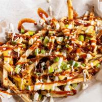 Twisted Fries · Bacon bits, cheese, ranch, chives, twisted barbecue.