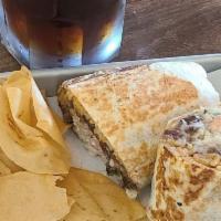 Burrito · a flour tortilla with your choice of meat, mexican rice, refried beans, pico de gallo, mozza...